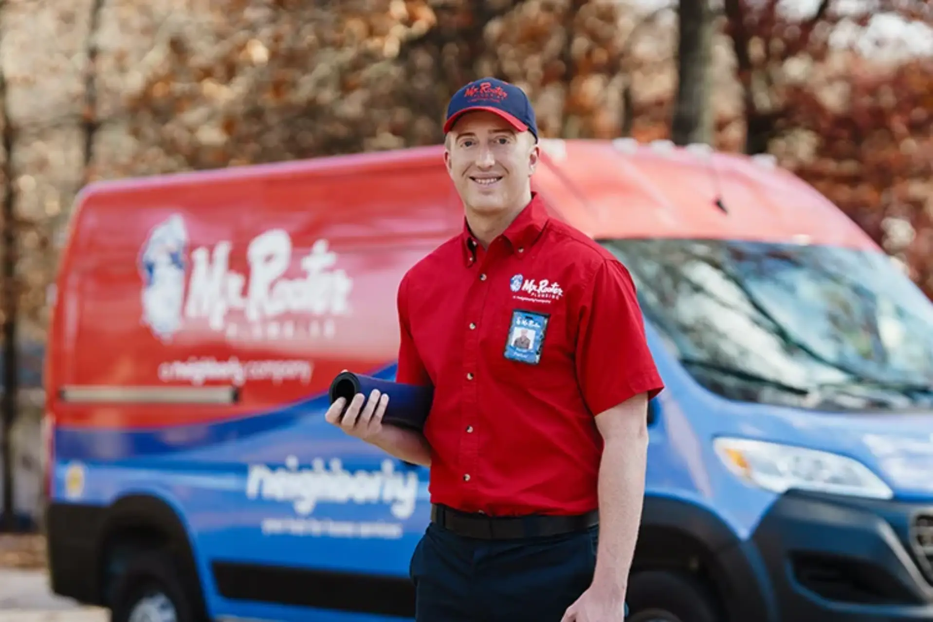 Mr. Rooter plumber ready to help with commercial sewer line replacement.